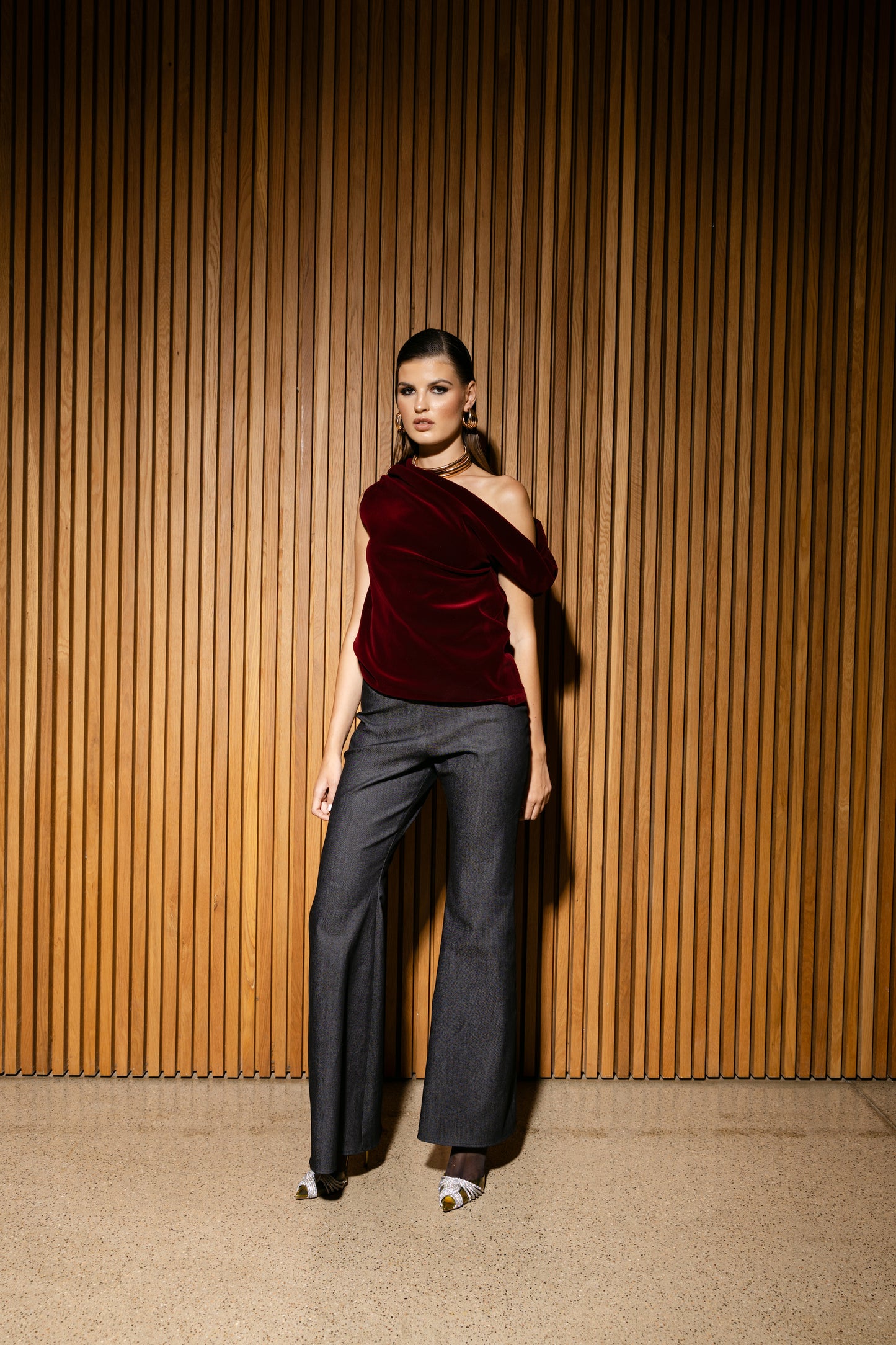 IRA by Irini Charalampous, @irathebrand online shop fashionable ready-to-wear womenswear brand velvet top AVA and jean trousers LUNA colour ruby red high heels Cyprus Greece