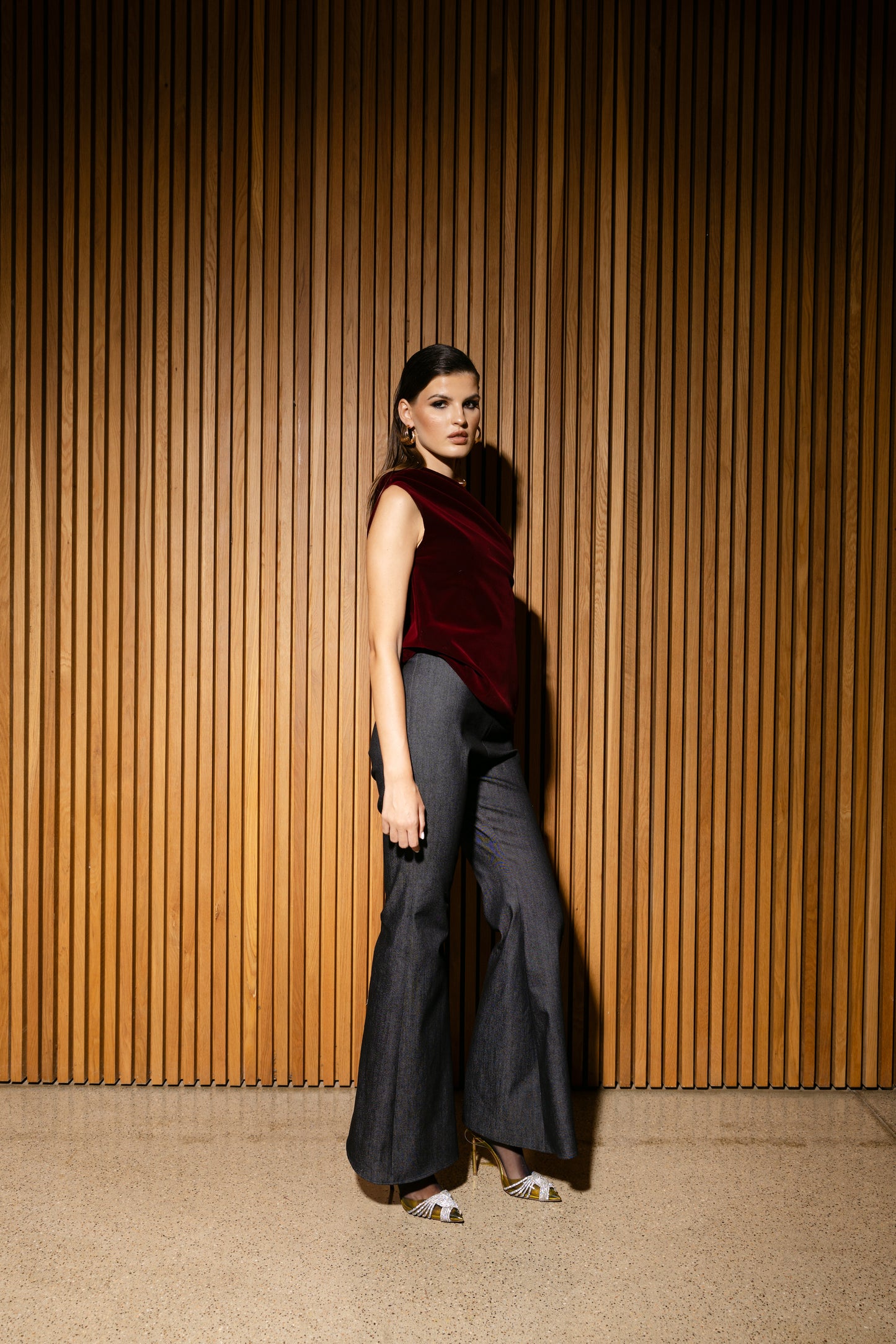 IRA by Irini Charalampous, @irathebrand online shop fashionable ready-to-wear womenswear brand velvet top AVA and jean trousers LUNA colour ruby red high heels Cyprus