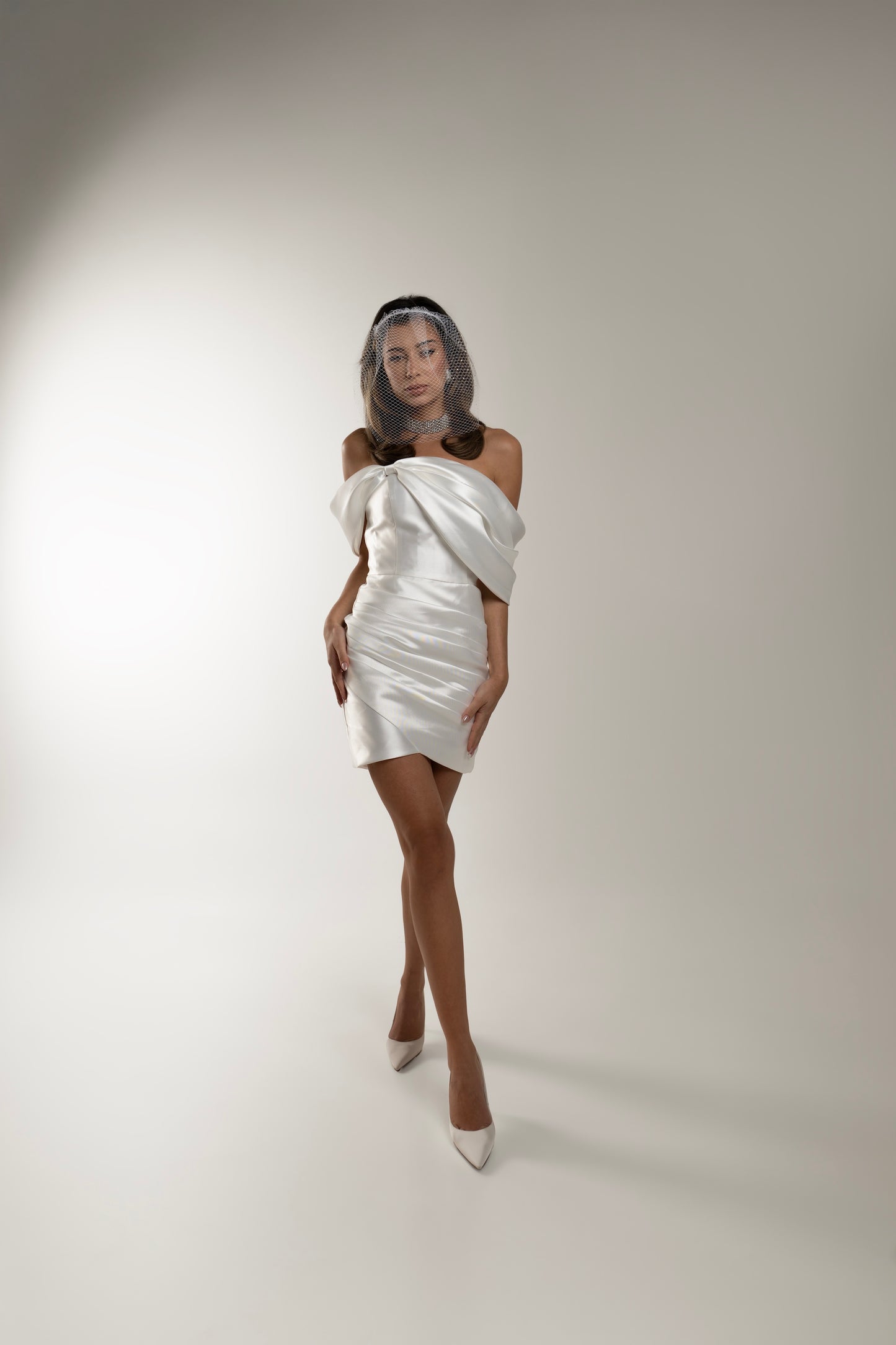 IRA by Irini Charalampous, @irathebrand online shop fashionable ready-to-wear womenswear brand off-shoulder mikado fabric CARA bridal mini dress in white color. Shop online from Cyprus and Greece.