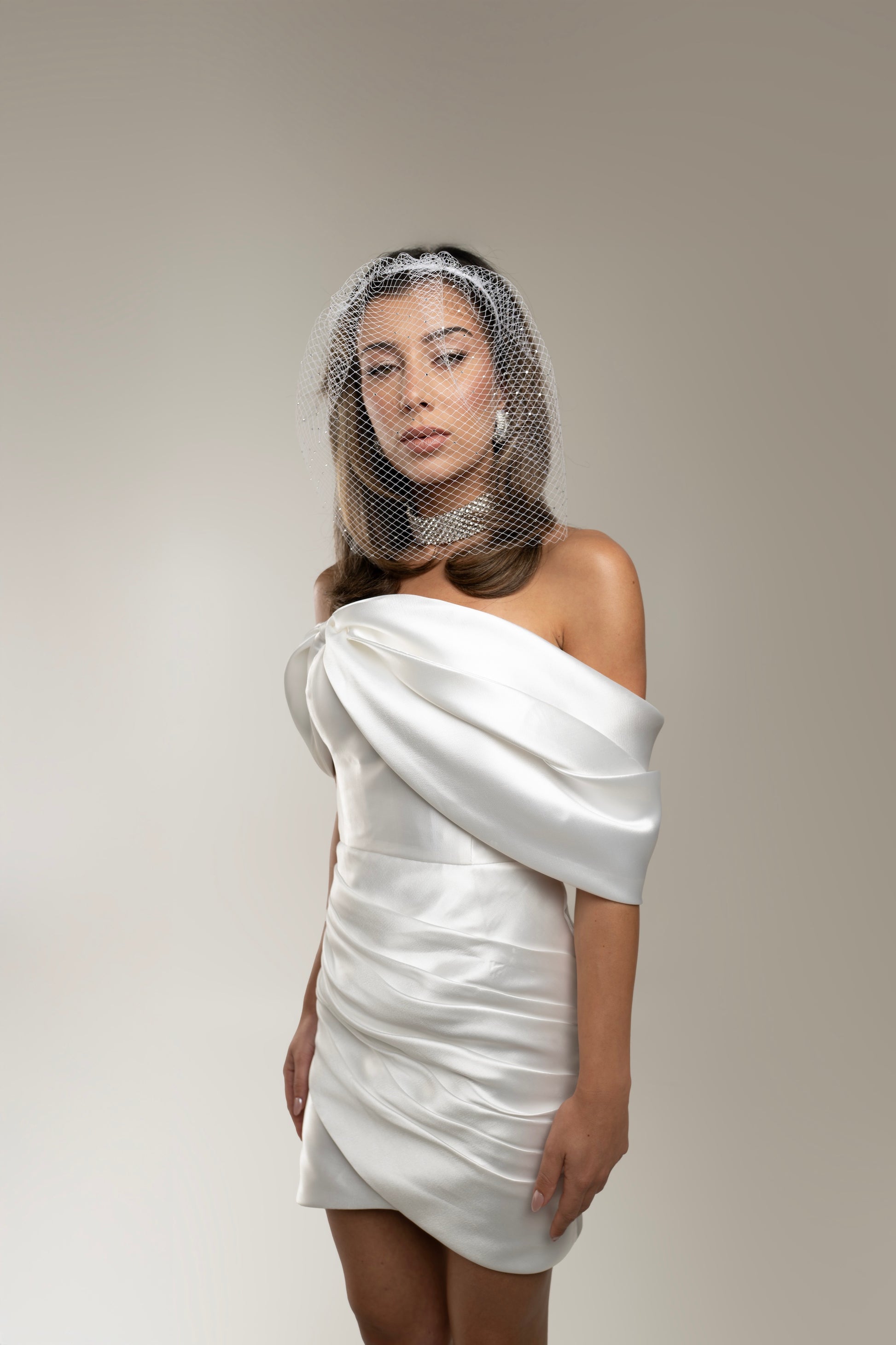 IRA by Irini Charalampous, @irathebrand online shop fashionable ready-to-wear womenswear brand off-shoulder mikado fabric CARA bridal mini dress in white color. Shop online from Cyprus and Greece.