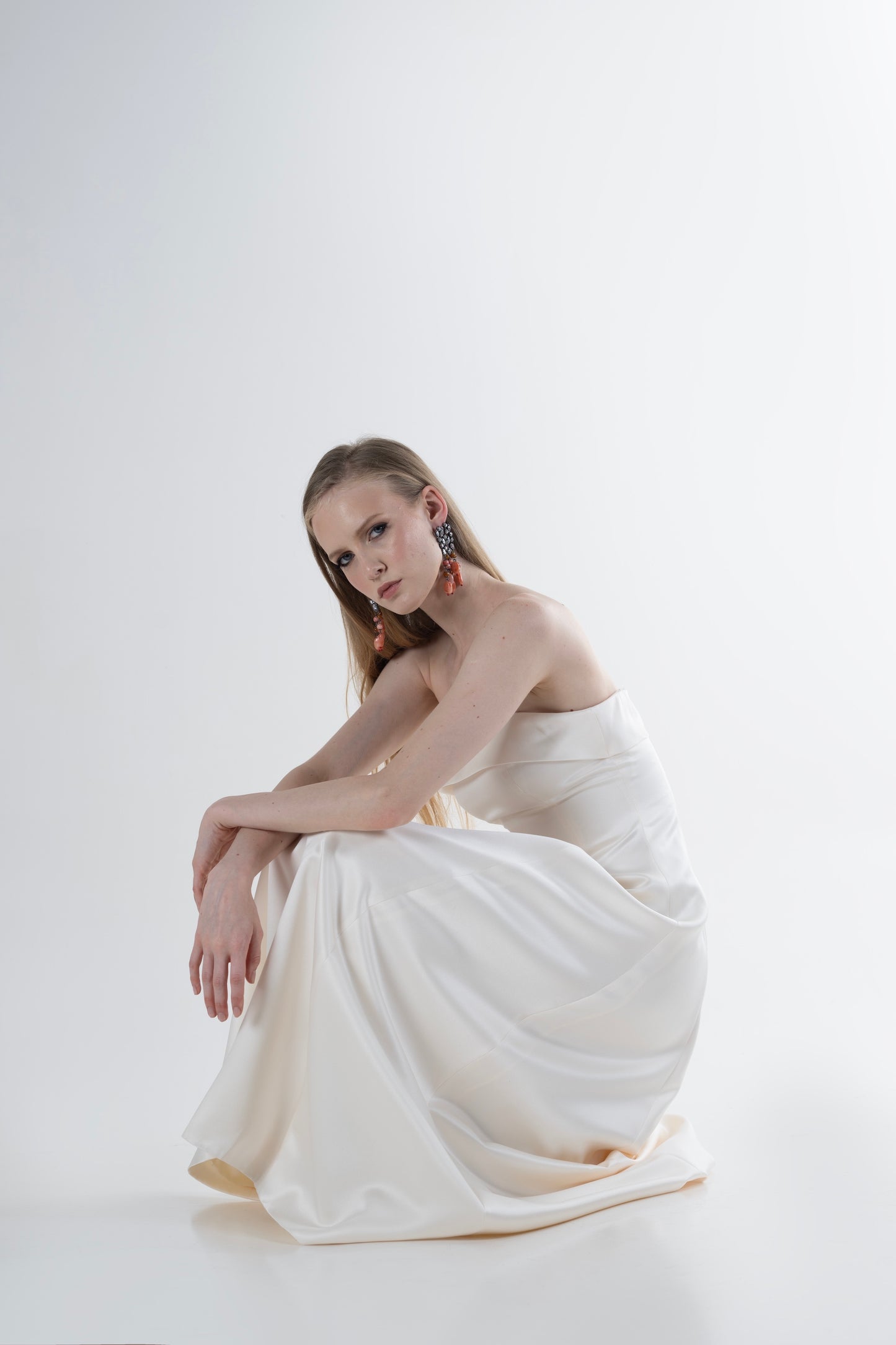 IRA by Irini Charalampous, @irathebrand online shop fashionable ready-to-wear womenswear brand NOOR strapless column gown in off white color. Shop online from Cyprus and Greece.