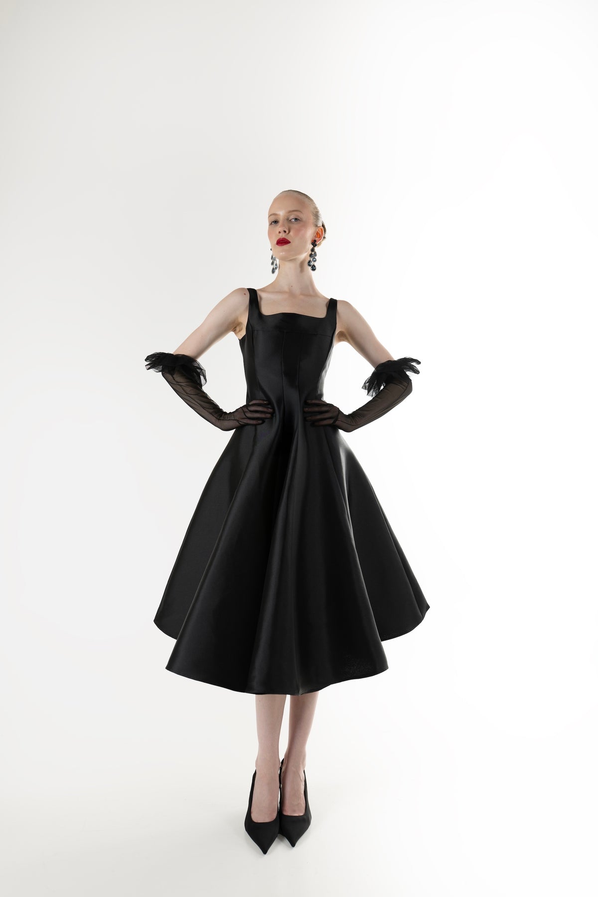IRA by Irini Charalampous, @irathebrand online shop fashionable ready-to-wear womenswear brand NINA sleeveless midi dress with square neckline featuring a sculpted bodice and circle full skirt in black color. Shop online from Cyprus and Greece.