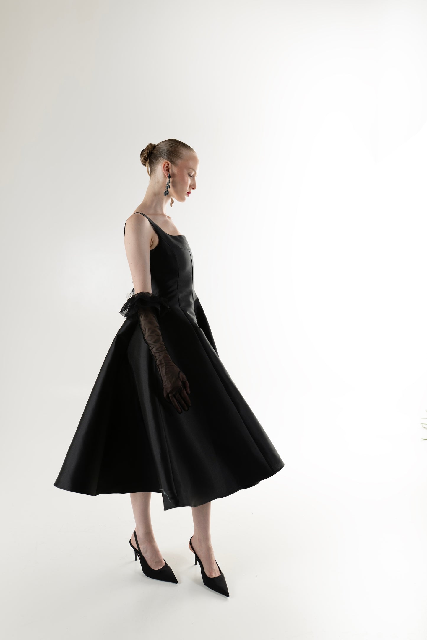 IRA by Irini Charalampous, @irathebrand online shop fashionable ready-to-wear womenswear brand NINA sleeveless midi dress with square neckline featuring a sculpted bodice and circle full skirt in black color. Shop online from Cyprus and Greece.