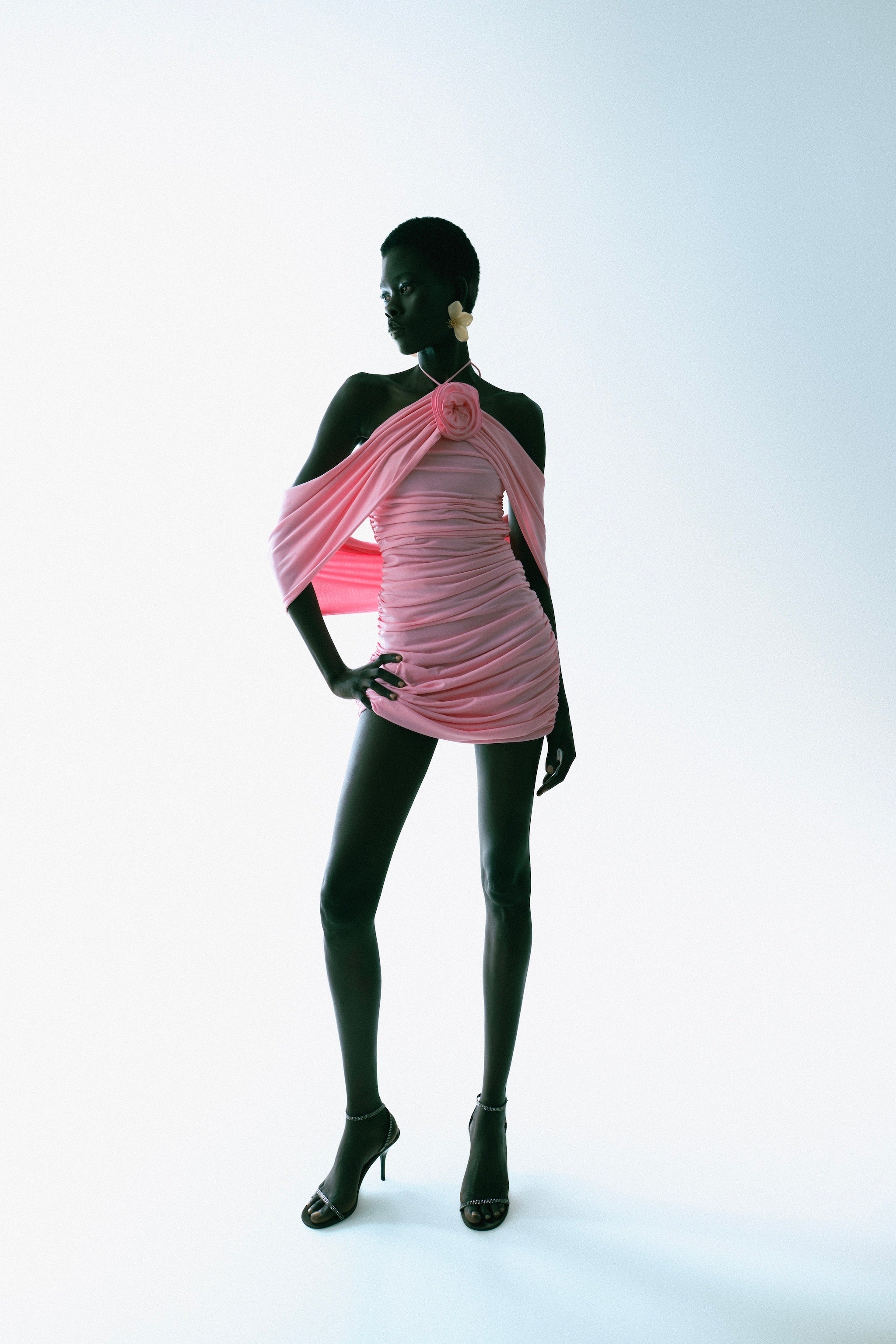 IRA by Irini Charalampous, @irathebrand online shop fashionable ready-to-wear womenswear brand AVA mini dress with ruching and rose at the neck in pink color. Shop online from Cyprus and Greece.