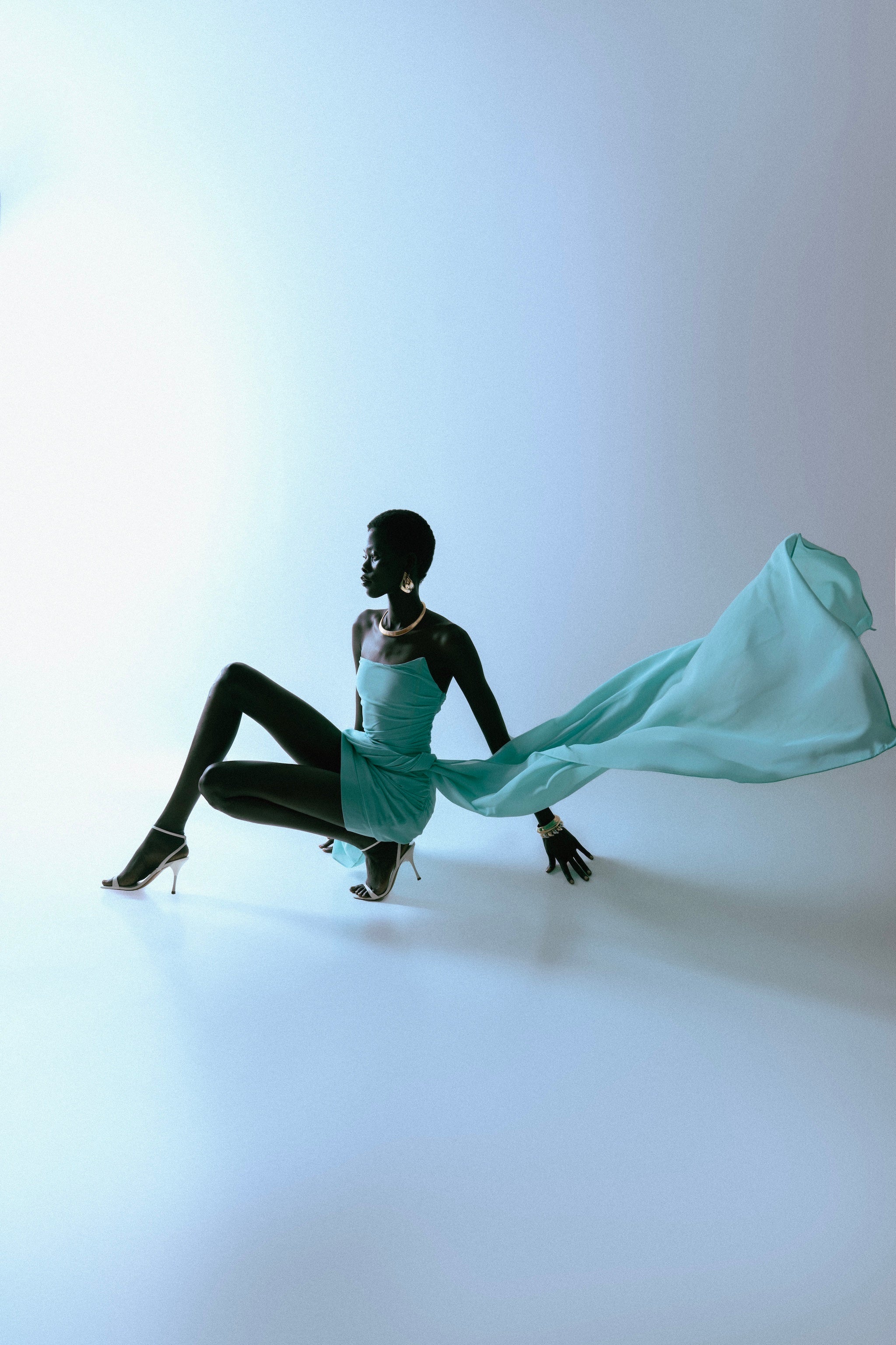 IRA by Irini Charalampous, @irathebrand online shop fashionable ready-to-wear womenswear brand TALA strapless mini dress with train in turquoise color. Shop online from Cyprus and Greece.