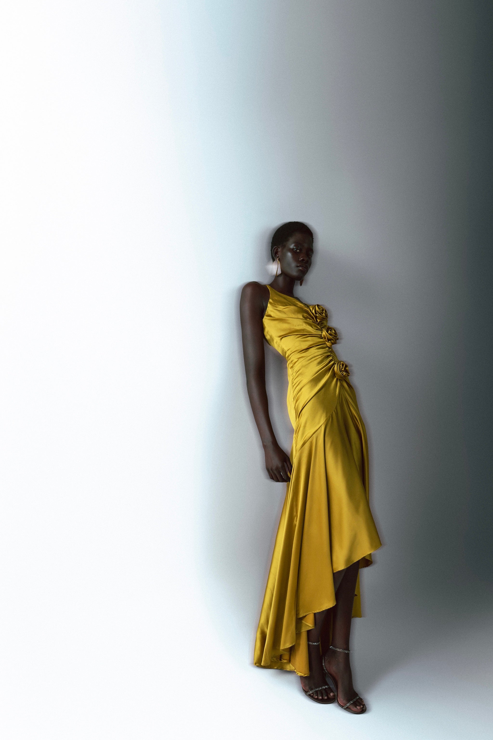 IRA by Irini Charalampous, @irathebrand online shop fashionable ready-to-wear womenswear brand CORA satin plunging neckline with ruching at the waist and roses maxi dress in ochre color. Shop online from Cyprus and Greece.