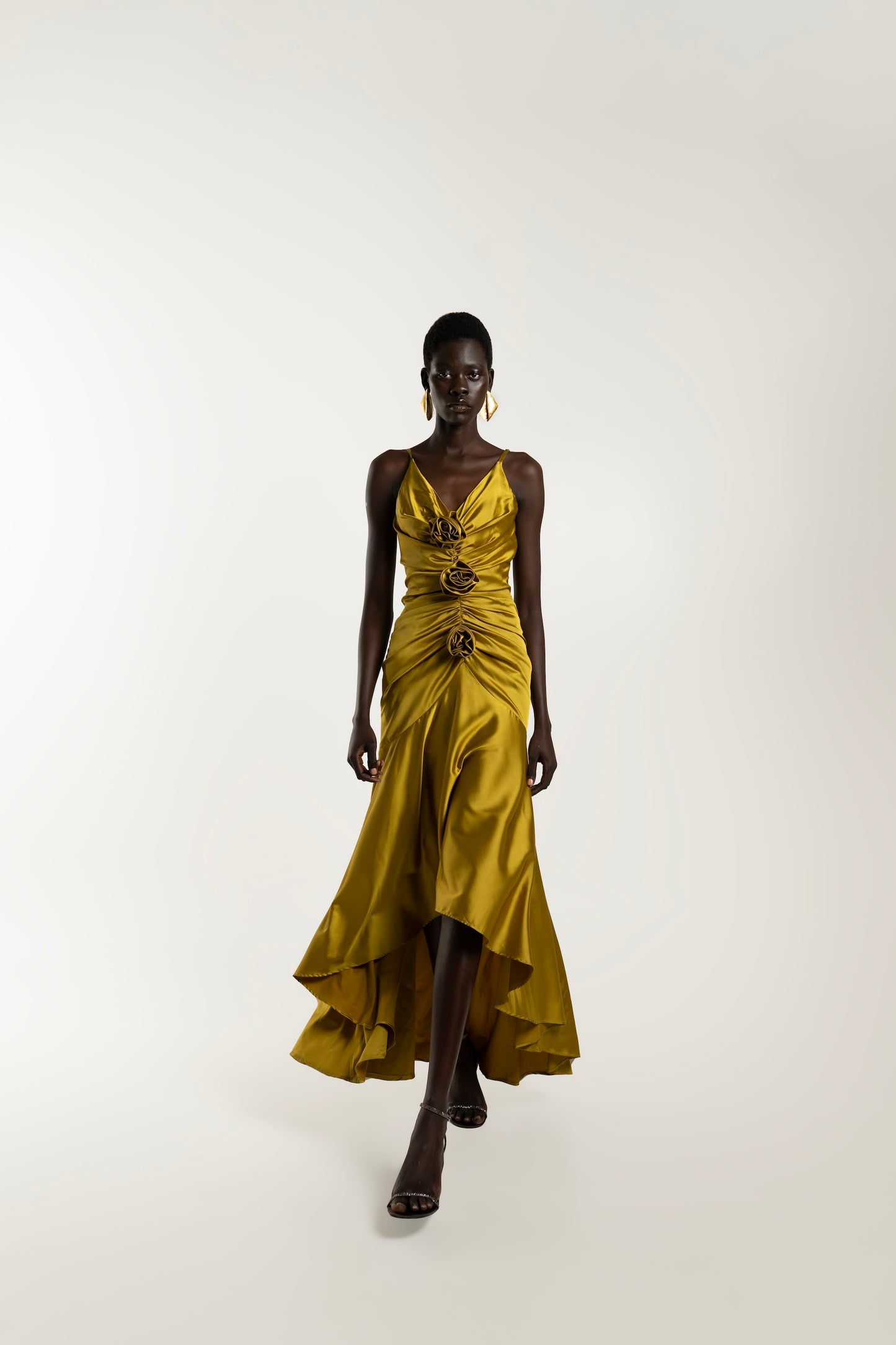 IRA by Irini Charalampous, @irathebrand online shop fashionable ready-to-wear womenswear brand CORA satin plunging neckline with ruching at the waist and roses maxi dress in ochre color. Shop online from Cyprus and Greece.