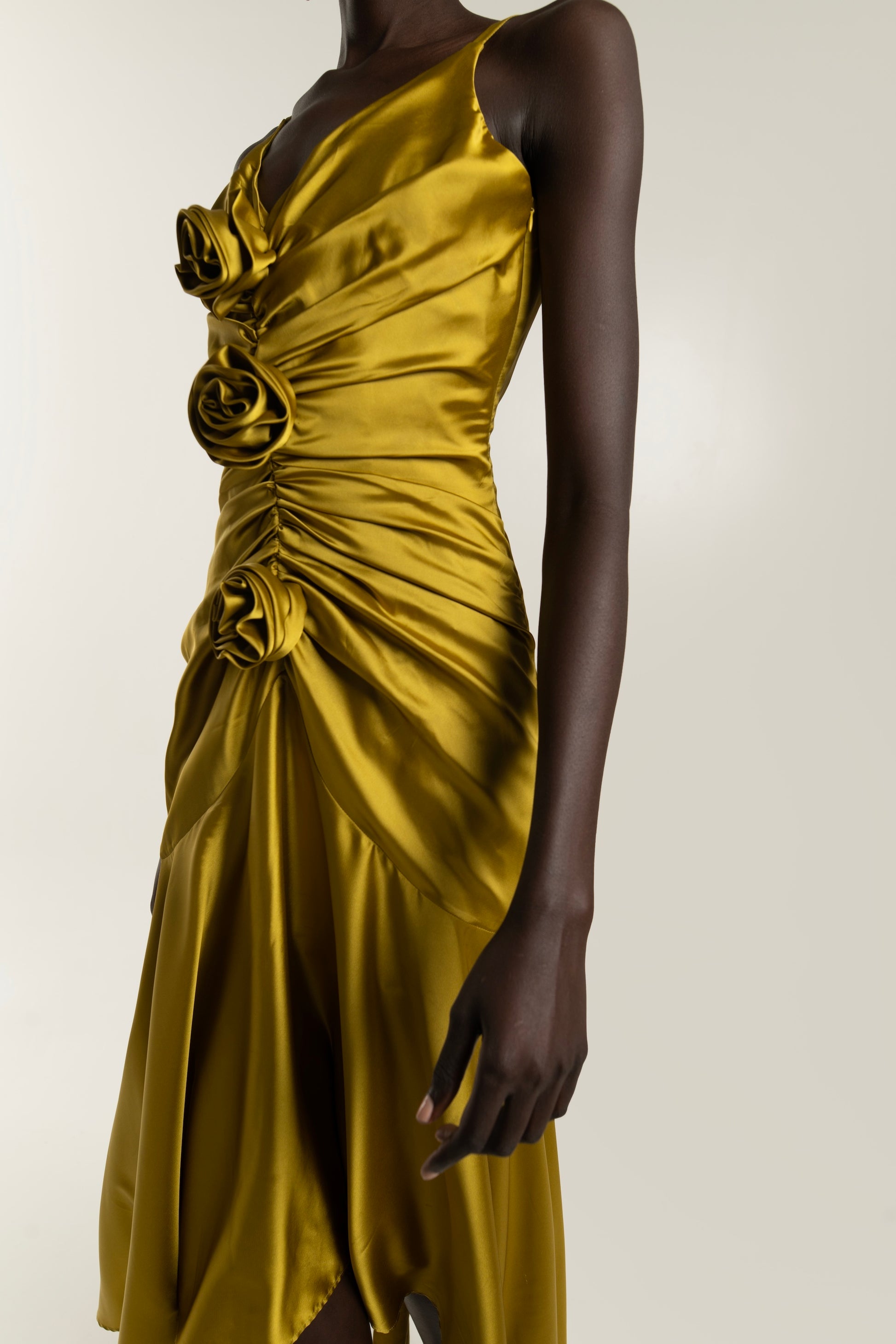 IRA by Irini Charalampous, @irathebrand online shop fashionable ready-to-wear womenswear brand CORA satin plunging neckline with ruching at the waist and roses maxi dress in ochre color. Shop online from Cyprus and Greece.