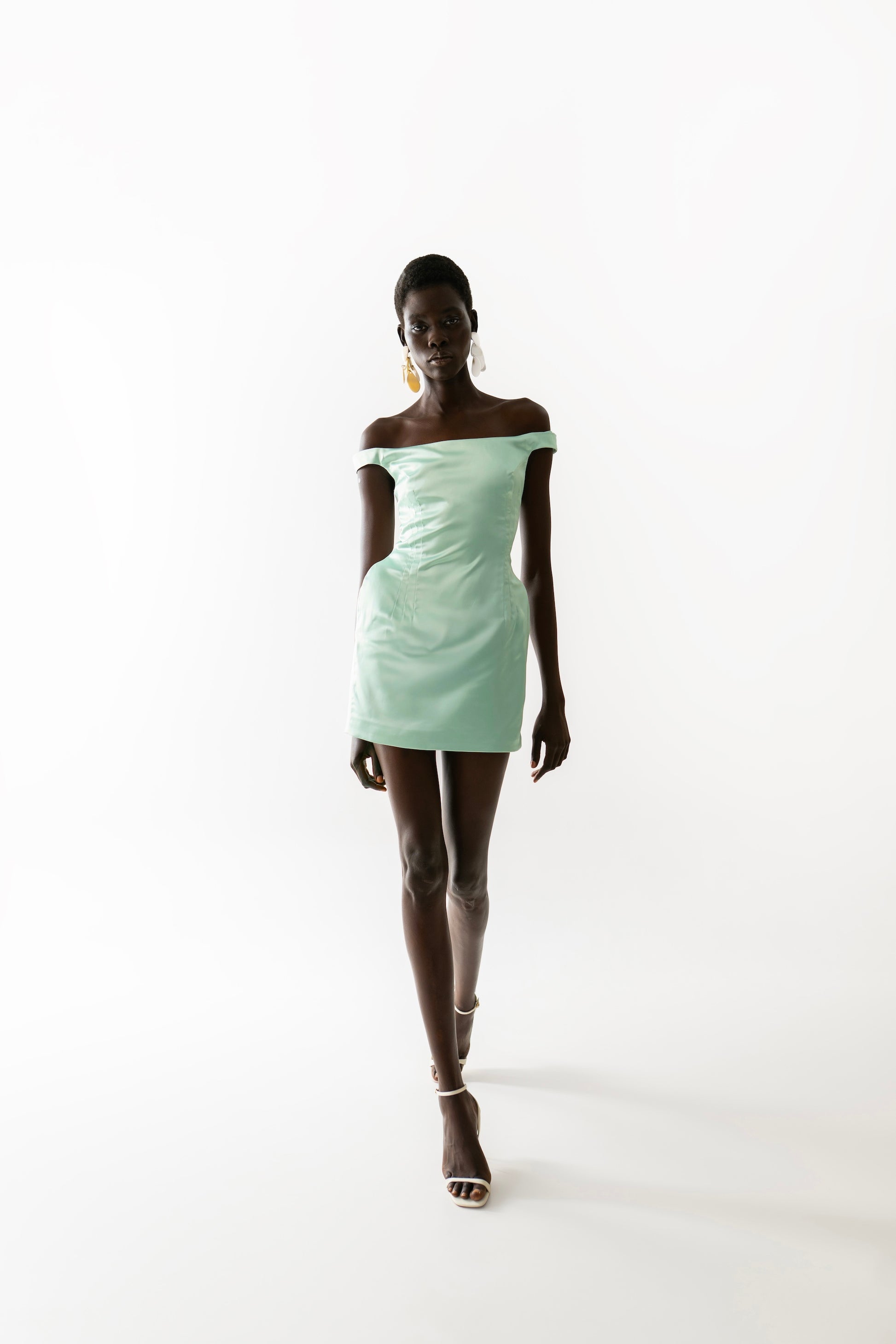 IRA by Irini Charalampous, @irathebrand online shop fashionable ready-to-wear womenswear brand LARA off shoulder with side shoulder pads mini dress in mint color. Shop online from Cyprus and Greece.