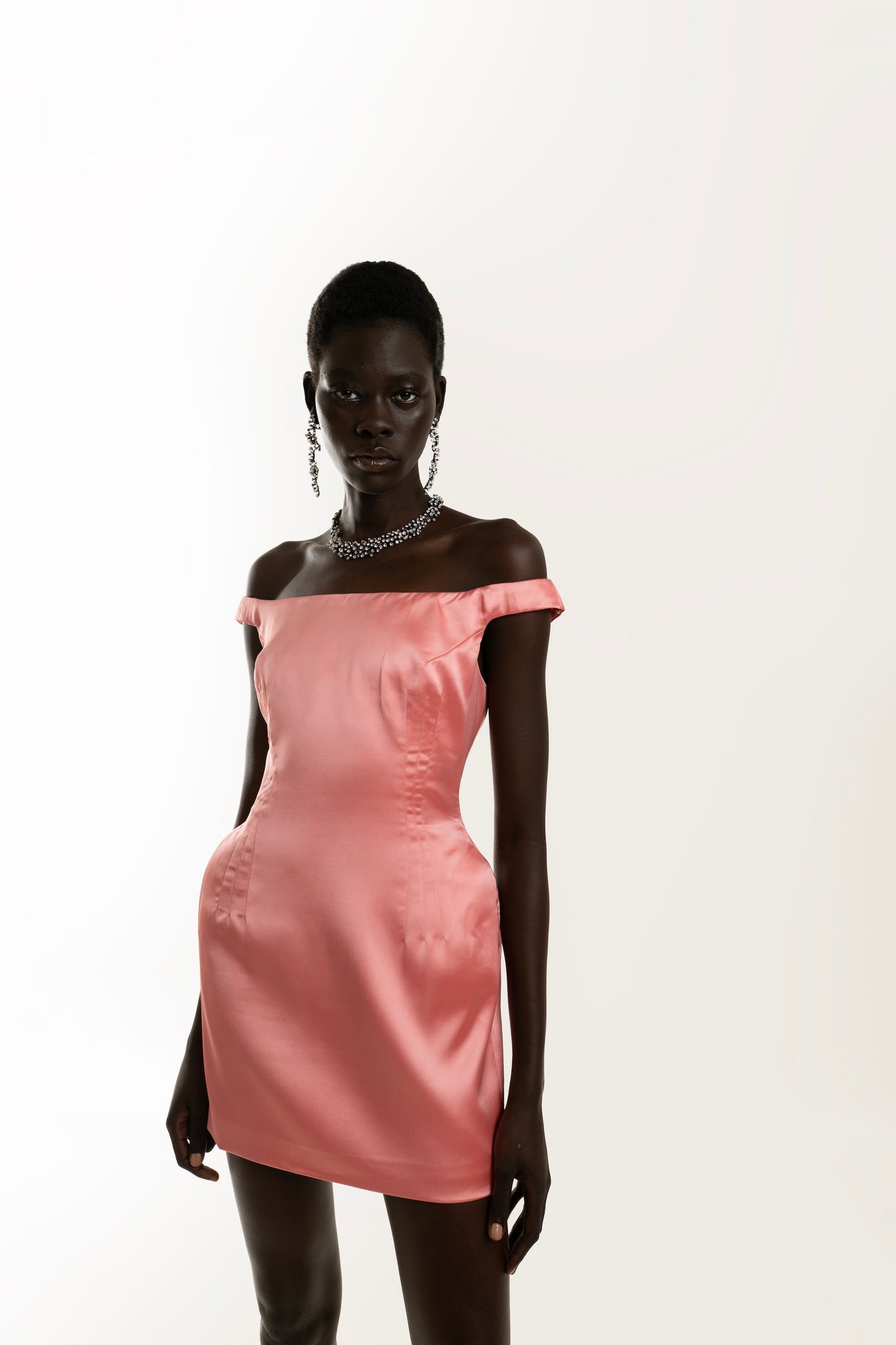 IRA by Irini Charalampous, @irathebrand online shop fashionable ready-to-wear womenswear brand LARA off shoulder with side shoulder pads mini dress in blush color. Shop online from Cyprus and Greece.