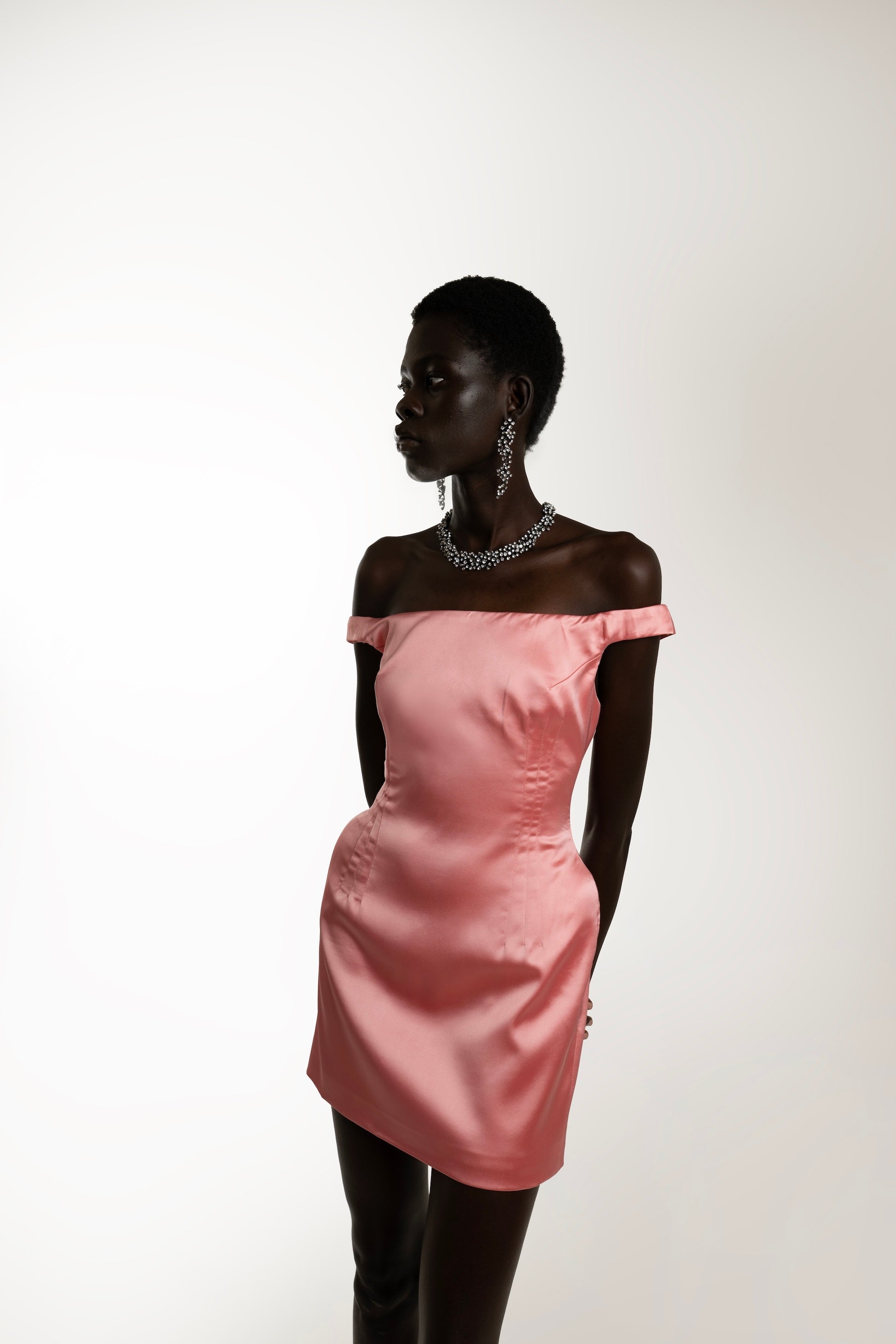 IRA by Irini Charalampous, @irathebrand online shop fashionable ready-to-wear womenswear brand LARA off shoulder with side shoulder pads mini dress in blush color. Shop online from Cyprus and Greece.