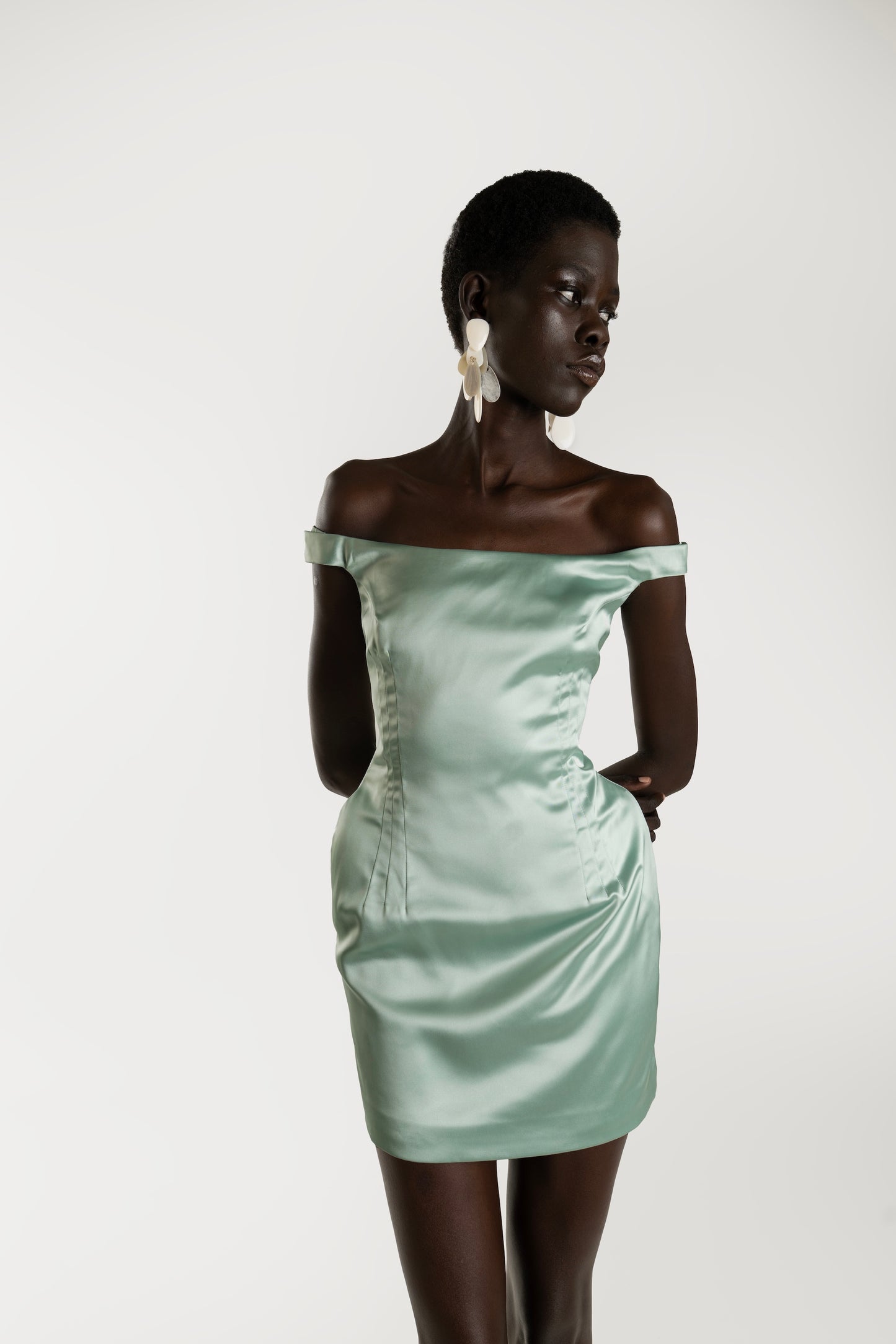 IRA by Irini Charalampous, @irathebrand online shop fashionable ready-to-wear womenswear brand LARA off shoulder with side shoulder pads mini dress in mint color. Shop online from Cyprus and Greece.