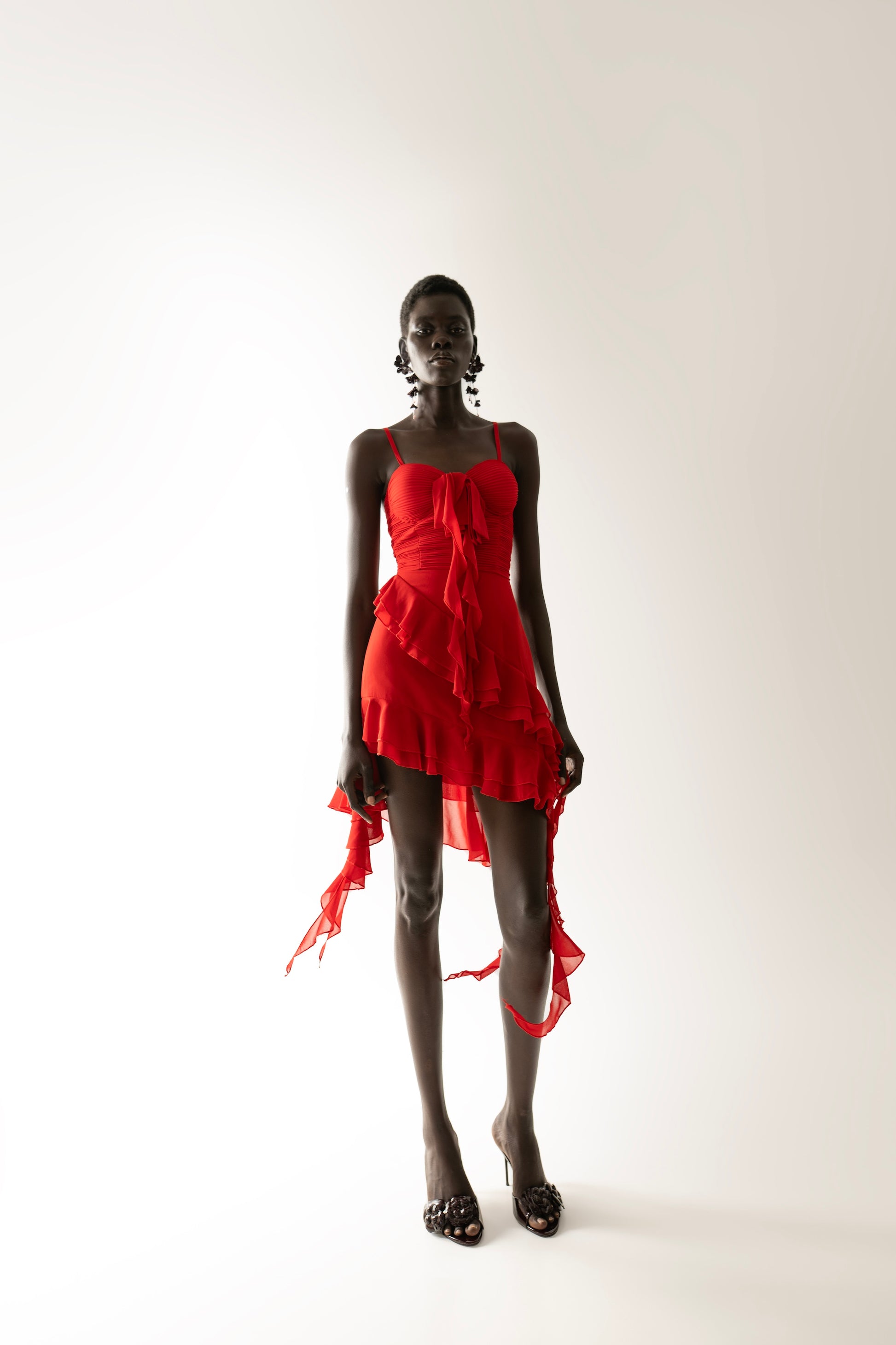 IRA by Irini Charalampous, @irathebrand online shop fashionable ready-to-wear womenswear brand NARA mini dress with hanging fringes and ruffles in red color. Shop online from Cyprus and Greece.