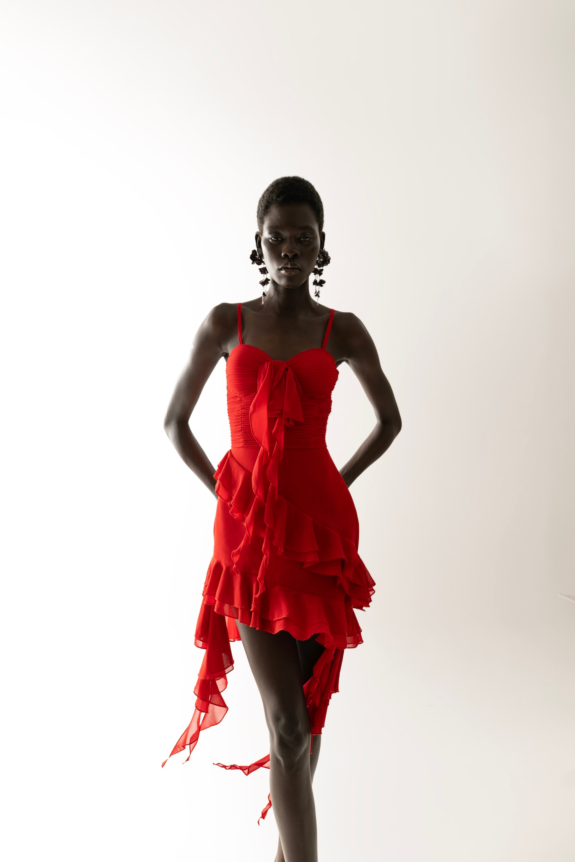 IRA by Irini Charalampous, @irathebrand online shop fashionable ready-to-wear womenswear brand NARA mini dress with hanging fringes and ruffles in red color. Shop online from Cyprus and Greece.