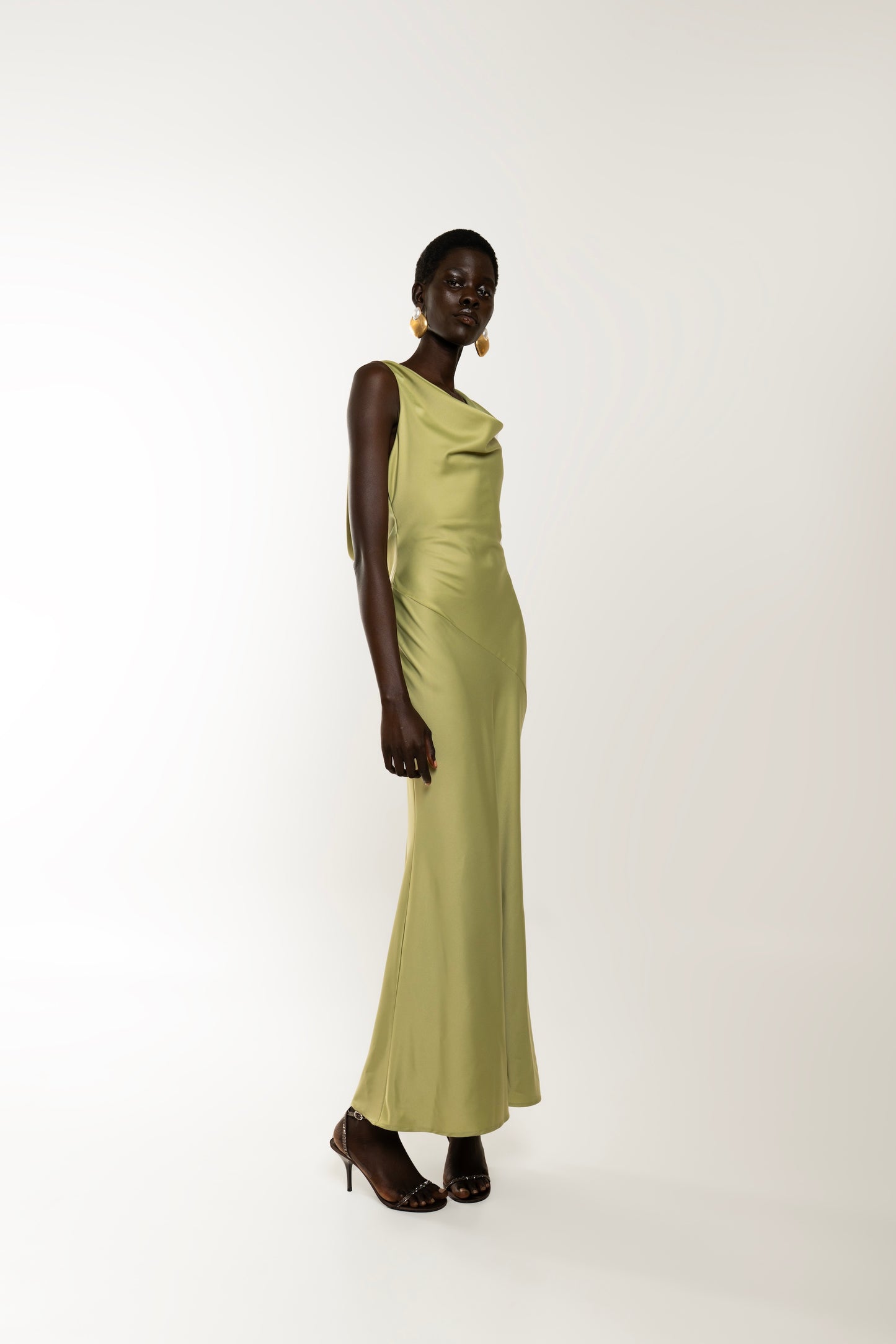 IRA by Irini Charalampous, @irathebrand online shop fashionable ready-to-wear womenswear brand KAIA satin basic maxi dress with open back and tie detail in olive  green color. Shop online from Cyprus and Greece.