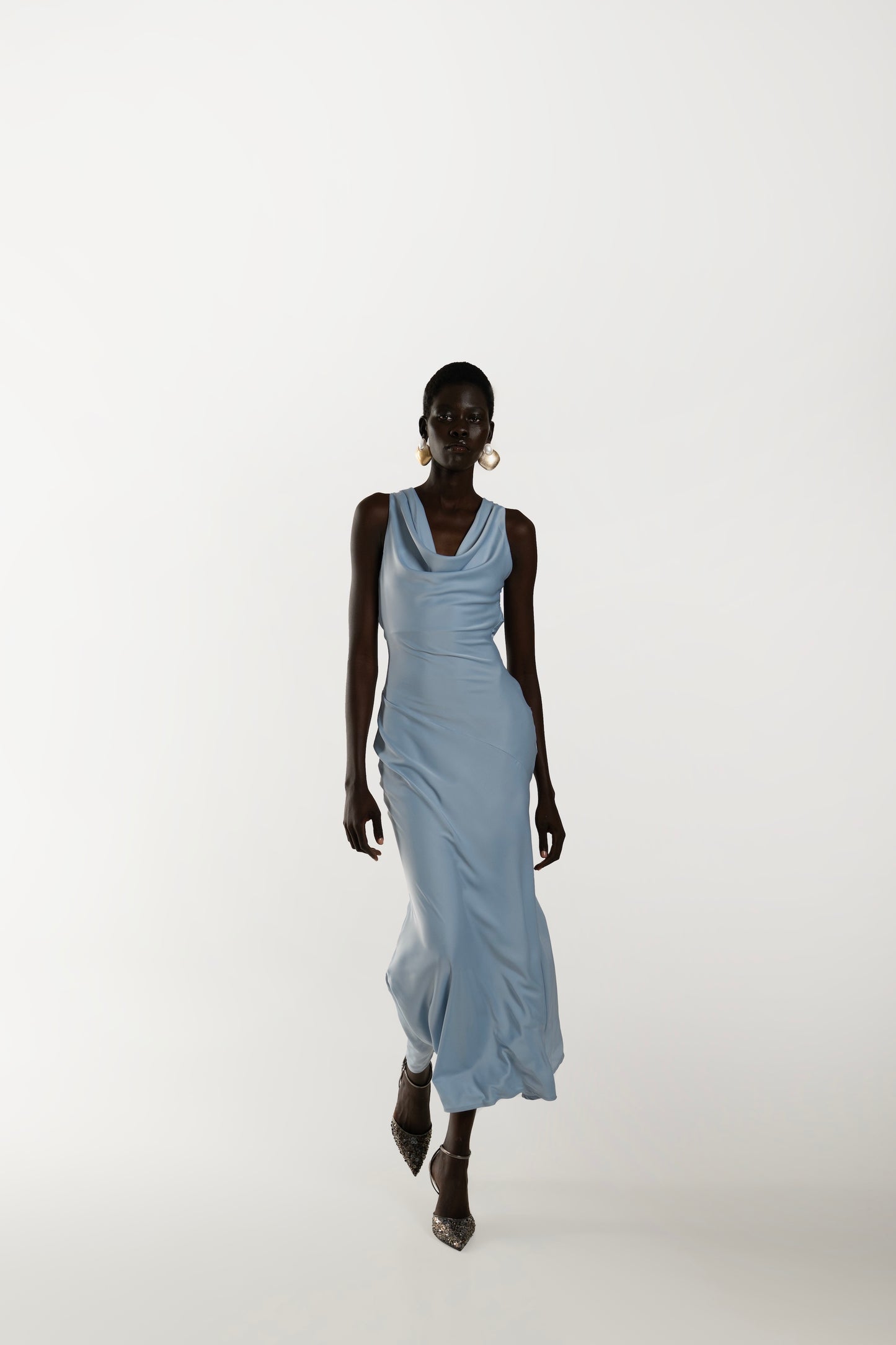 IRA by Irini Charalampous, @irathebrand online shop fashionable ready-to-wear womenswear brand KAIA satin basic maxi dress with open back and tie detail in powder blue color. Shop online from Cyprus and Greece.