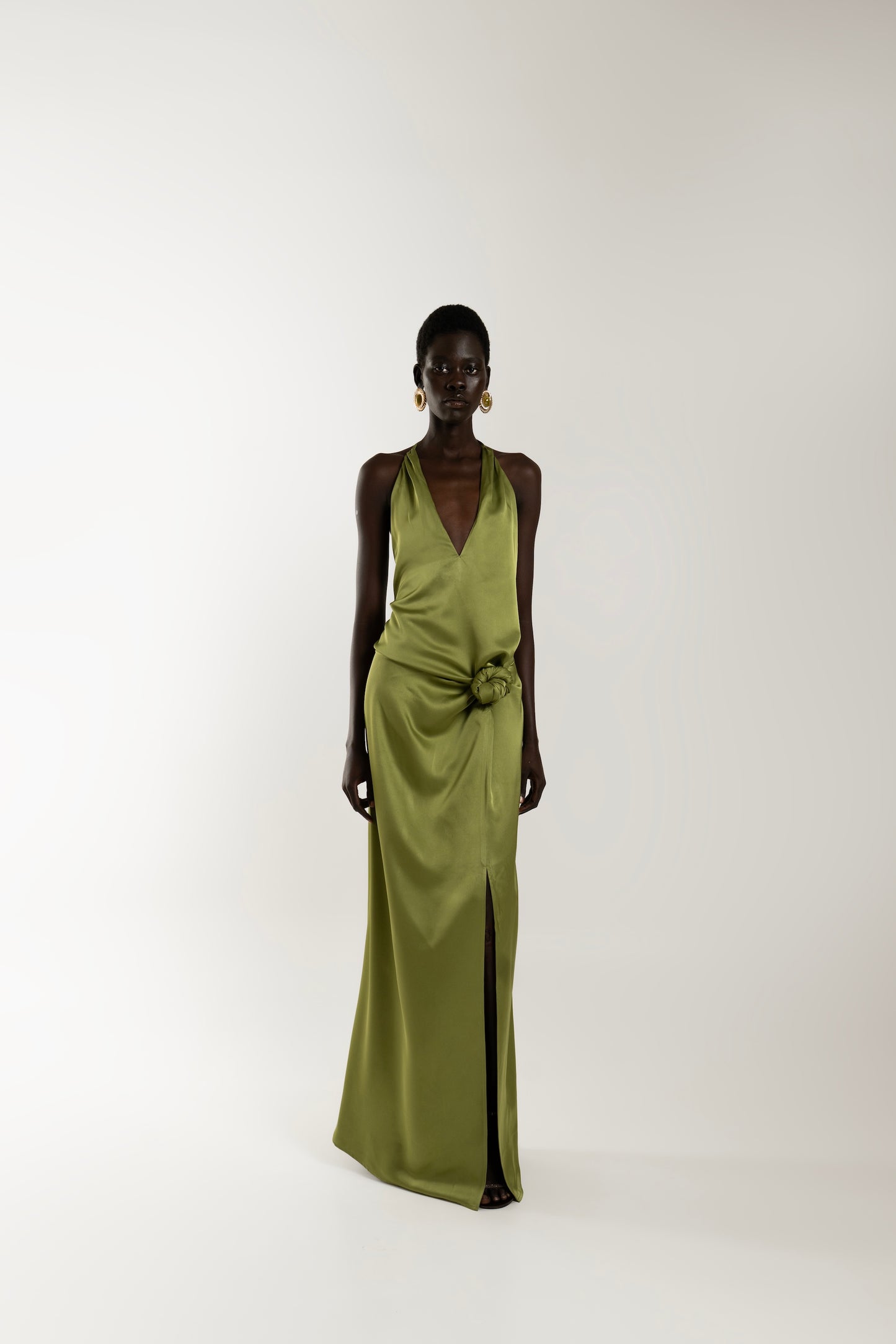 IRA by Irini Charalampous, @irathebrand online shop fashionable ready-to-wear womenswear brand ELIA satin maxi dress with knot detail in khaki green color. Shop online from Cyprus and Greece.