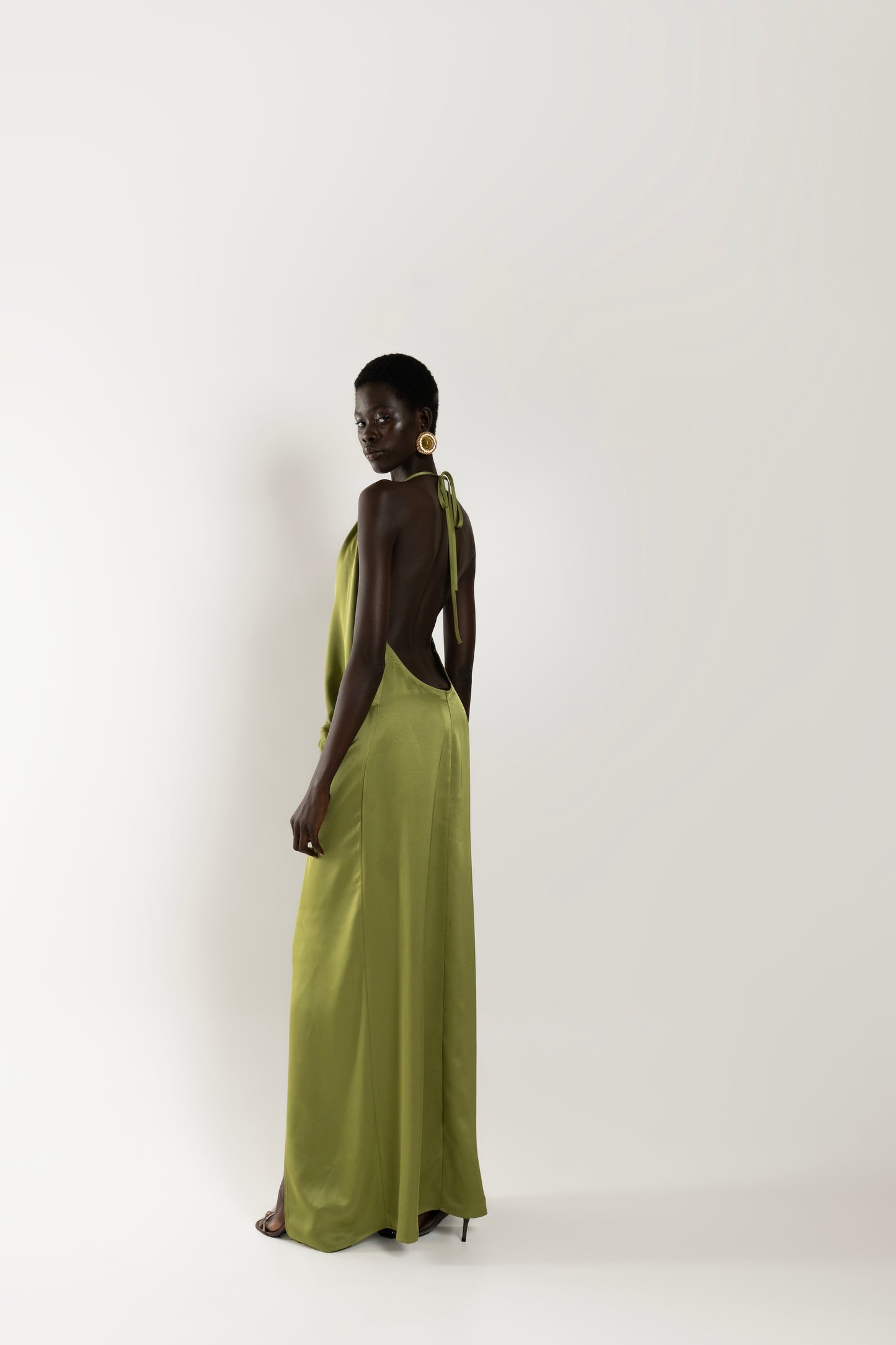 IRA by Irini Charalampous, @irathebrand online shop fashionable ready-to-wear womenswear brand ELIA satin maxi dress with knot detail in khaki green color. Shop online from Cyprus and Greece.